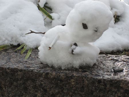 Snowman with cigarette